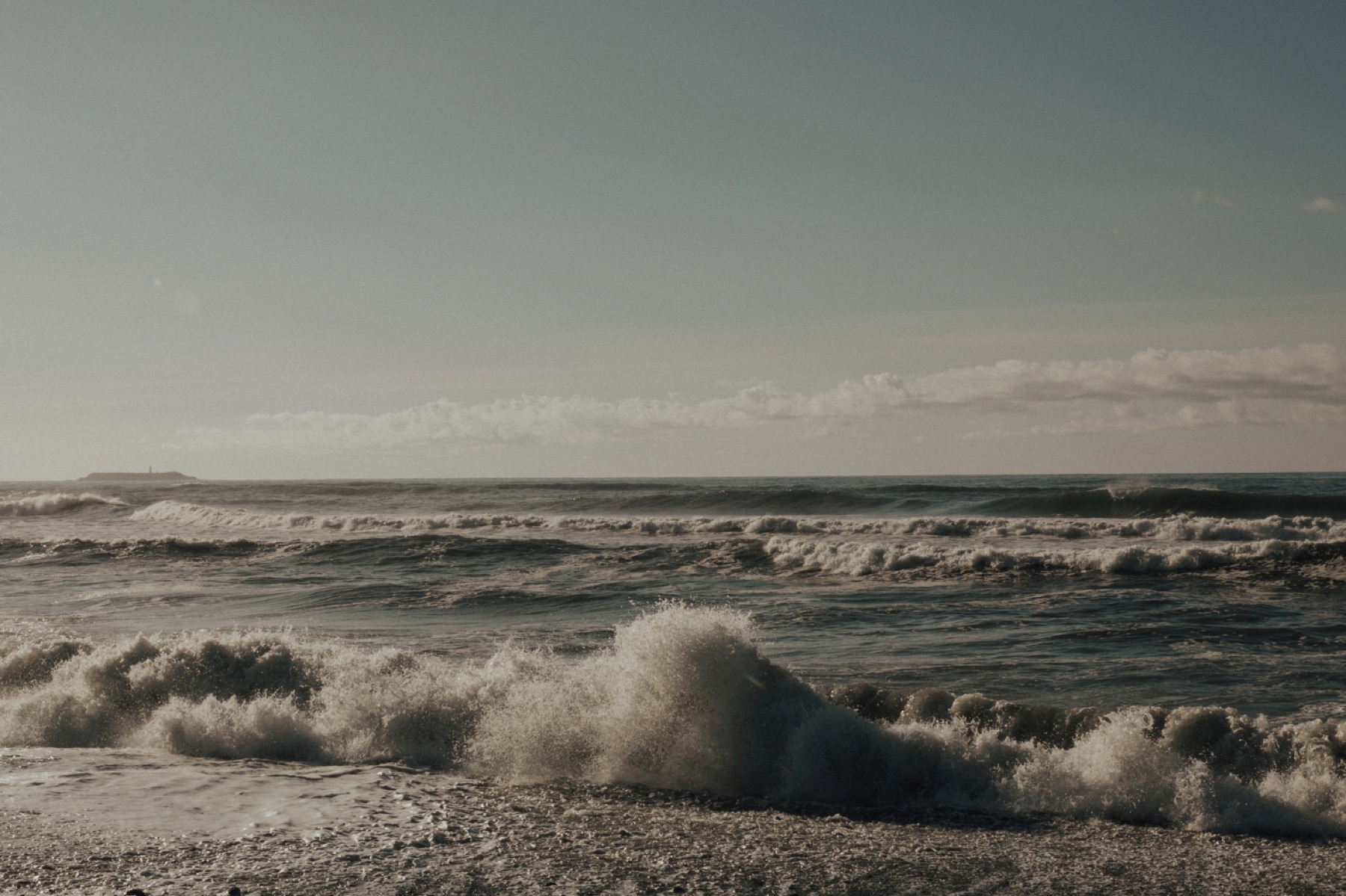 Waves breaking on a pebble beach