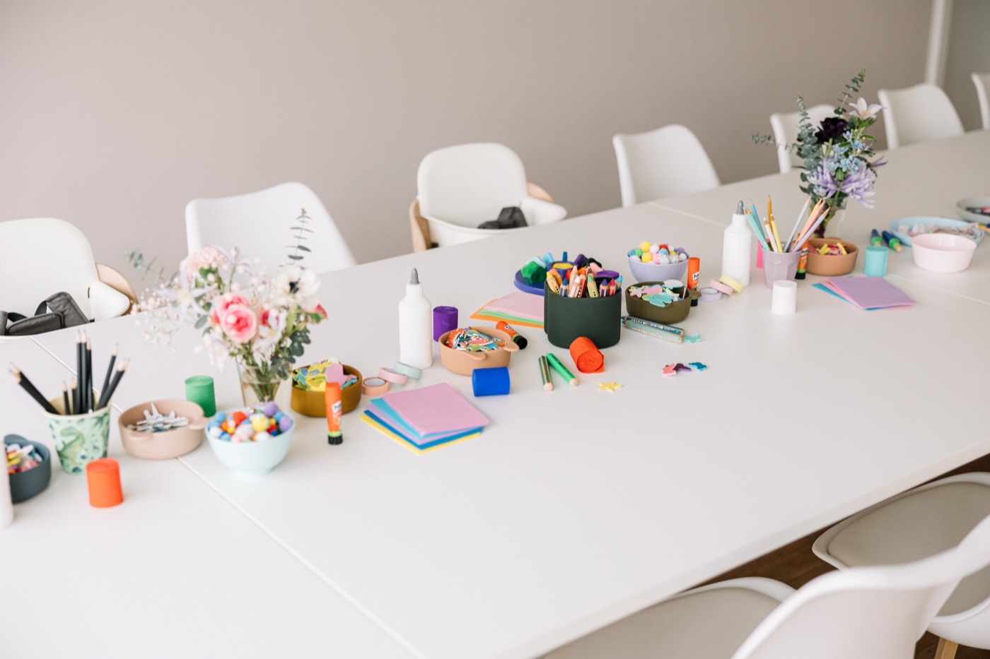 Louisa’s Childcare: crafting table with colourful supplies